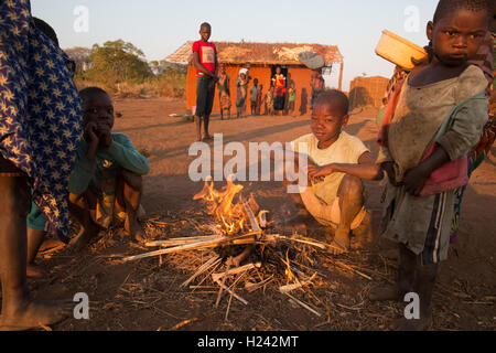 Lalaua district, Nampula Province, Mozambique, August 2015: Lighting a fire.    Photo by Mike Goldwater Stock Photo