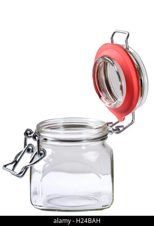 Empty glass jar with the open cap hold with metal wire isolated over the white background. Clipping path included Stock Photo