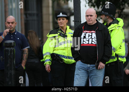 Newcaslte Upon Tyne, UK. 24th Sep, 2016. Saturday the 24 of Sept. 2016. EDL supporter assesses the numbers of Newcastle Unites. Credit:  Dan Cooke/Alamy Live News