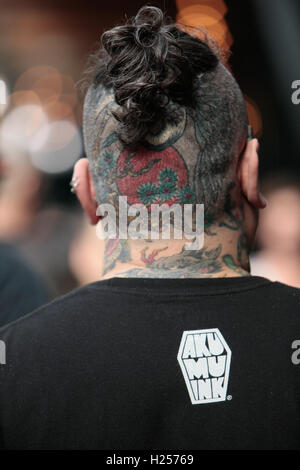 London UK 24 September 2016/The 12th London Tattoo Convention received a large crowd in Tobacco Docks, hundreds of international artists using different tattooing technics were hard at work to keep up with the huge demand for their services@Paul Quezada-Neiman/Alamy Live News Credit:  Paul Quezada-Neiman/Alamy Live News Stock Photo