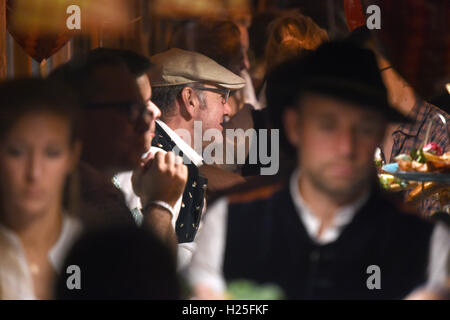 Munich, Germany. 24th Sep, 2016. US-actor and director Kevin Spacey celebrating at Kaefer tent at the Oktoberfest in Munich, Germany, 24 September 2016. The 183rd Oktoberfest continues until 3 October 2016. PHOTO: FELIX HOERHAGER/dpa/Alamy Live News Stock Photo