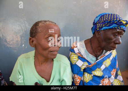 Ribaue Hospital, Ribaue,  Nampula Province, Mozambique, August 2015:  Benificiaries queue to have their cataract operations. Photo by Mike Goldwater Stock Photo