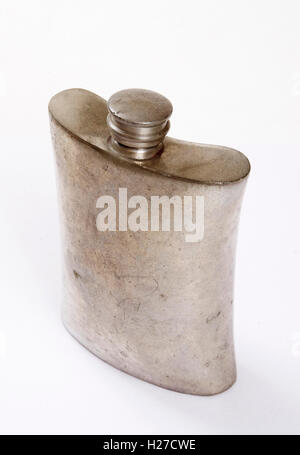Silver plated antique metal hip flask with screw top Stock Photo