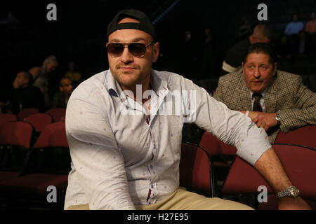 Tyson Fury watches the action at Manchester Arena. Stock Photo