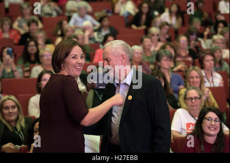 Scottish Labour leader Kezia Dugdale greets newly re-elected Labour leader Jeremy Corbyn, during Labour's women's conference in Liverpool on the eve of the Labour Party's annual conference. Stock Photo