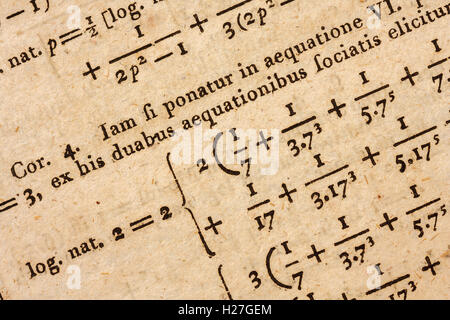 Closeup of a page of a 200 years old mathematics book with complex calculations Stock Photo