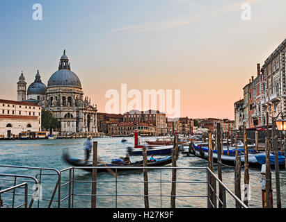 Venice city sunset over Grand Canal , gondola and Santa Maria cathedral Stock Photo