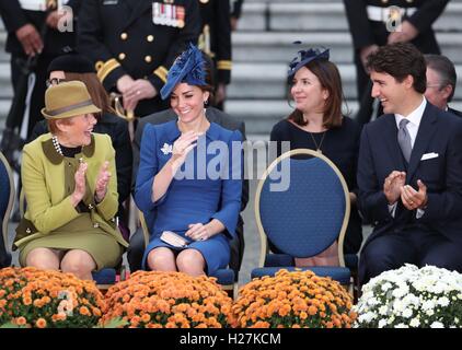 The Duchess of Cambridge laughs during a speech by the Duke of Cambridge alongside Canadian Prime Minister Justine Trudeau(far right) during an official ceremonial welcome at the British Columbia Legislative Assembly in Victoria, on the first day of the Royal Tour to Canada. Stock Photo