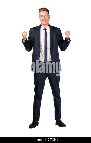 Happy young businessman raised fists Stock Photo