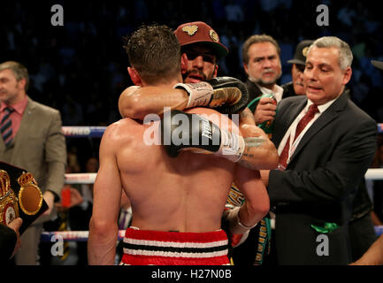 Anthony Crolla hugs Jorge Linares is announced as the winner of the WBA, WBC Diamond and Ring Magazine Lightweight World Titles fight at Manchester Arena. Stock Photo