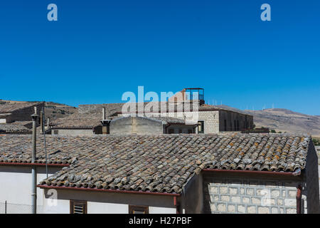 Ancient Sicilian rural architecture. Roofs with old clay tiles. All uninhabited houses. Old buildings. The places of Montalbano, Stock Photo