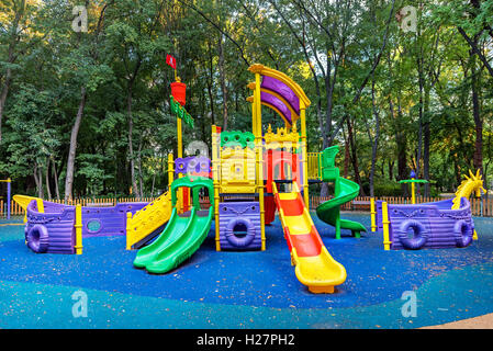 Children playground on yard in the park. Stock Photo