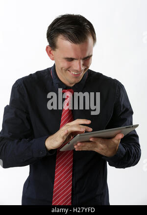 Businessman using digital tablet Stock Photo