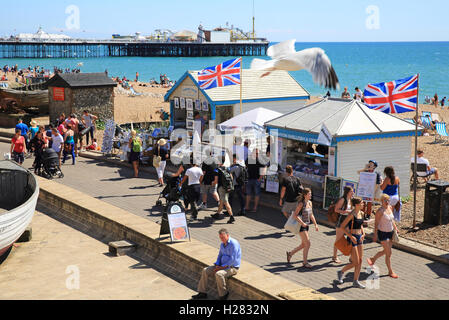 Brighton seafront with Union Jack flags flying, on a summer's day, in East Sussex, England, UK Stock Photo