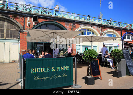 Riddle & Finns on the Beach, serving classic seafood dishes, on Brighton seafront, in East Sussex, England, UK