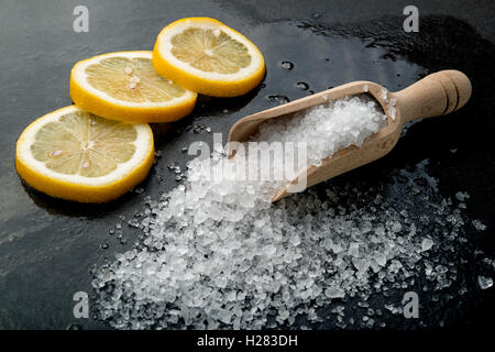 lemon and salt on a black board Stock Photo