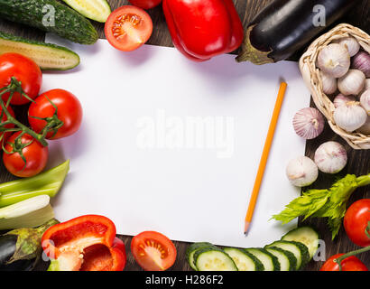 Vegetables tiled around a sheet of paper Stock Photo