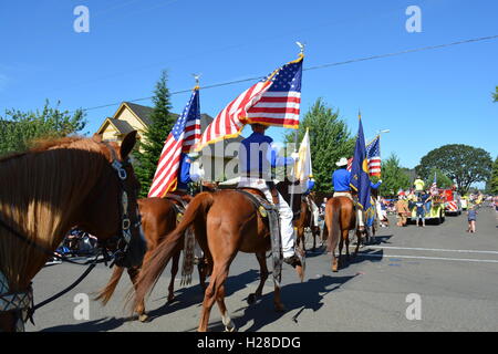 Portland, USA - July 4, 2012:  Men on horse parade in Independence day in Portland, Oregon Stock Photo