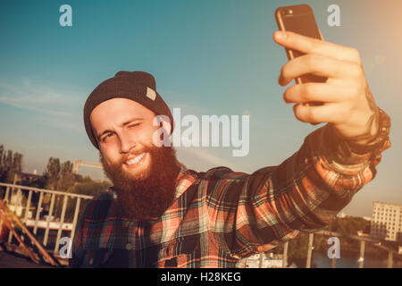 Handsome Bearded Man In Red Shirt Stock Photo
