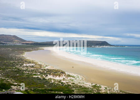 The scenic Noordhoek beach with dramatic sky in winter. Panoramic view from Chapman's Peak Drive, Cape Peninsula, Cape Town, Sou Stock Photo