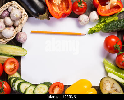 Vegetables tiled around a sheet of paper Stock Photo