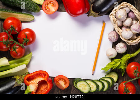 Vegetables tiled around a sheet of paper Stock Photo