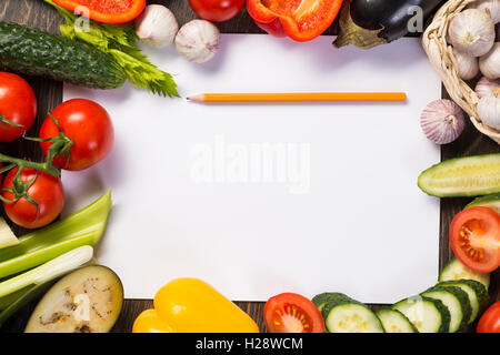 Vegetables tiled around a sheet of paper Stock Photo