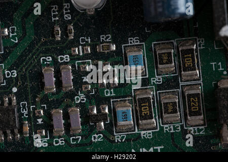 Electric circuit board miniaturized components diodes capacitors resistors Stock Photo