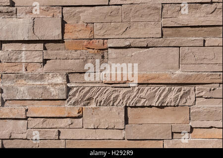 closely stacked dry stone wall slate quartz layers of stone showing texture Stock Photo