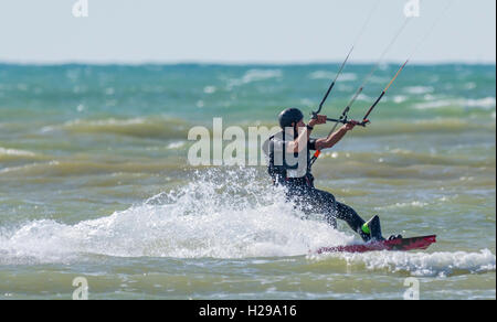 Kitesurfer on the sea. Stock Photo