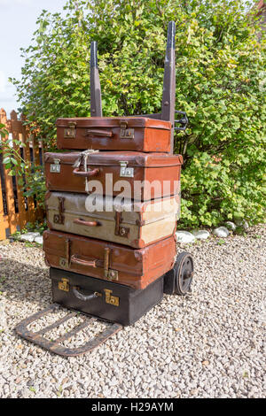 Old leather suitcases on the platform of a heritage steam railway (Severn Valley railway) Arley, Worcestershire UK Stock Photo