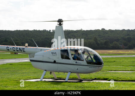 Robinson R44 Raven II helicopter at Wellesbourne Airfield, UK Stock Photo