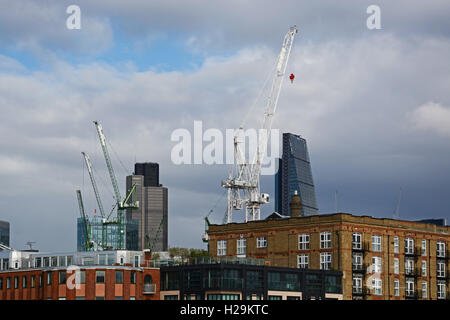 Cranes at work in City of London, London, England. Stock Photo