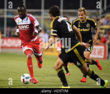 September 25, 2016: New England Revolution forward Kei Kamara (13) dribbles the ball down the pitch against the Columbus defense. Columbus, OH, USA. Brent Clark Alamy Live News Stock Photo