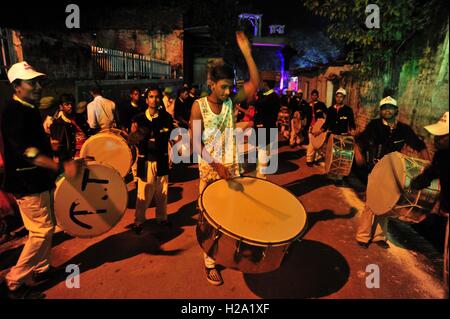 Allahabad, Uttar Pradesh, India. 26th Sep, 2016. Allahabad: Traditional drum players performs during a religious procession Ravan ki Barat in Allahabad on September 26, 2016, held to mark the Dussehra festival. The name Dussehra is derived from Sanskrit Dasha-hara literally means removal of ten referring to Lord Rama's victory over the ten-headed demon king Ravana. Dussehra is celebrated on the tenth day of the month of Ashwin according to the Hindu calendar which corresponds to September or October of the Gregorian calendar. Credit:  Prabhat Kumar Verma/ZUMA Wire/Alamy Live News Stock Photo