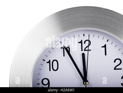 Silver round wall clock isolated on white background Stock Photo