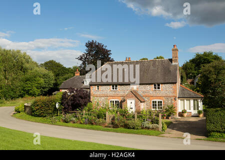 Typical country cottage in a small village in the West Sussex countryside. Stock Photo