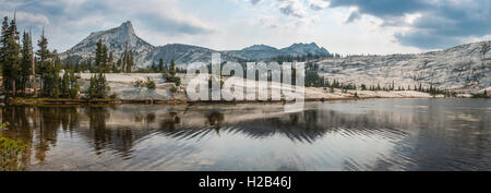 Mountain reflected in lake, Cathedral Peak, Lower Cathedral Lake, Sierra Nevada, Yosemite National Park, Cathedral Range Stock Photo