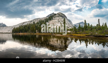 Mountain reflected in a lake, Lower Cathedral Lake, Sierra Nevada, Yosemite National Park, Cathedral Range, California, USA Stock Photo