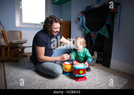 Stay-at-home dad, taking shared parental leave, one of just 3,000 British fathers said to be taking up shared parental leave. Stock Photo
