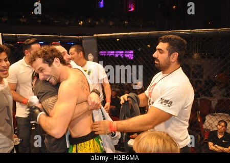 Black belt Luiz Tosta takes the win early in the first by knock out and is joined by the Stock Photo