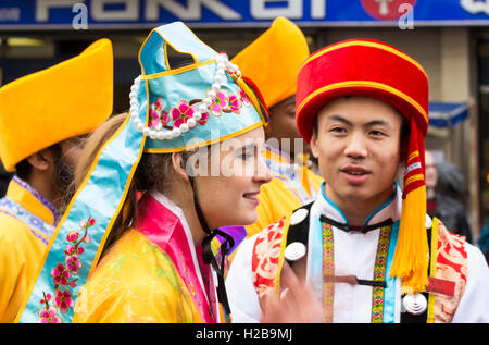 Paris, France-February 14, 2016: The unidentified participants on traditional New Year Chinese Parade in Paris, France. Stock Photo