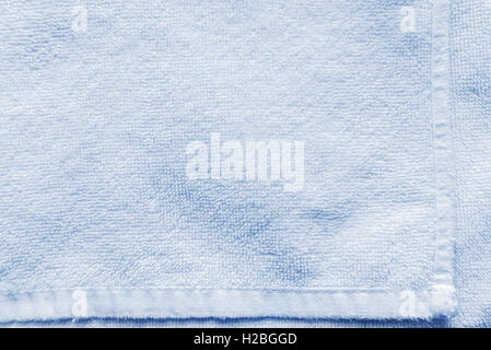 Light blue bath towel texture as background Stock Photo