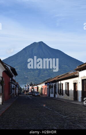 View of Volcano Water / Volcan de Agua from Catalina´s Arch Street at Antigua, Guatemala, Central America Stock Photo