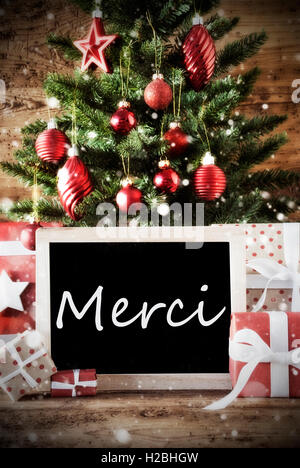 Christmas Tree With Merci Means Thank You Stock Photo