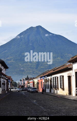 View of Volcano Water / Volcan de Agua from Catalina´s Arch Street at Antigua, Guatemala, Central America Stock Photo