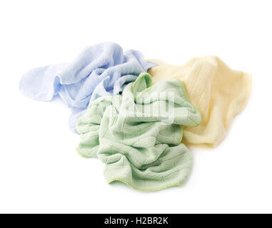 Pile of crumpled rags over white isolated background Stock Photo
