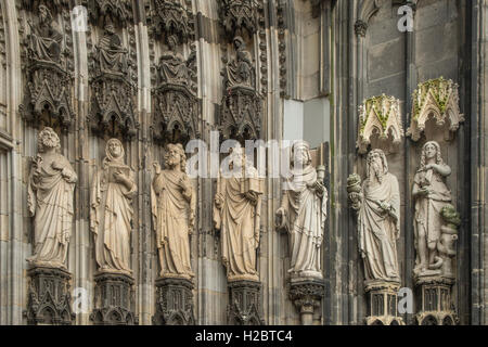 Statuettes at Main Entrance to Cathedral of St Peter and St Mary, Cologne, North Rhine Westphalia, Germany Stock Photo