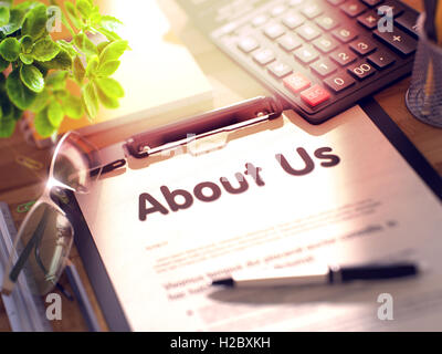 About Us Concept on Clipboard. 3D. Stock Photo