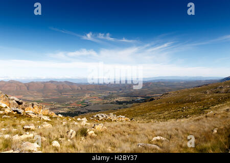 Landscape view - Farmland on a plato with mountains in the background looking over the beautiful Swartberg. Stock Photo